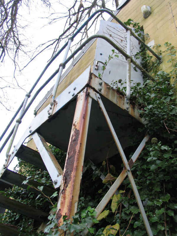 stairway with open door to building Freshford Mill site