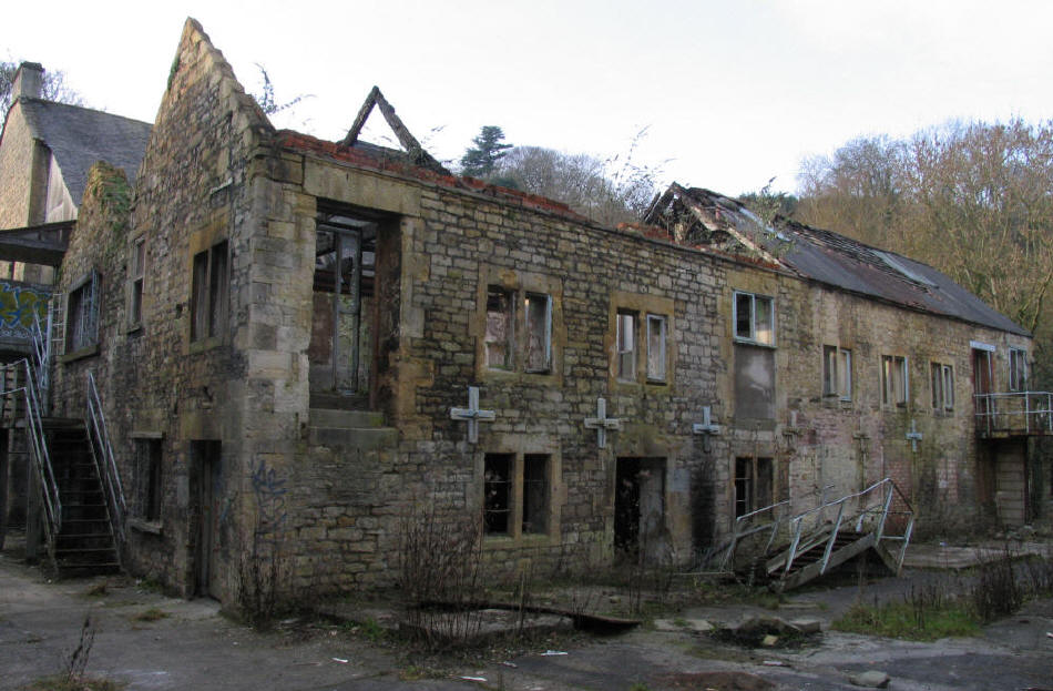Substantial old building in state of disrepair at Freshford Mill